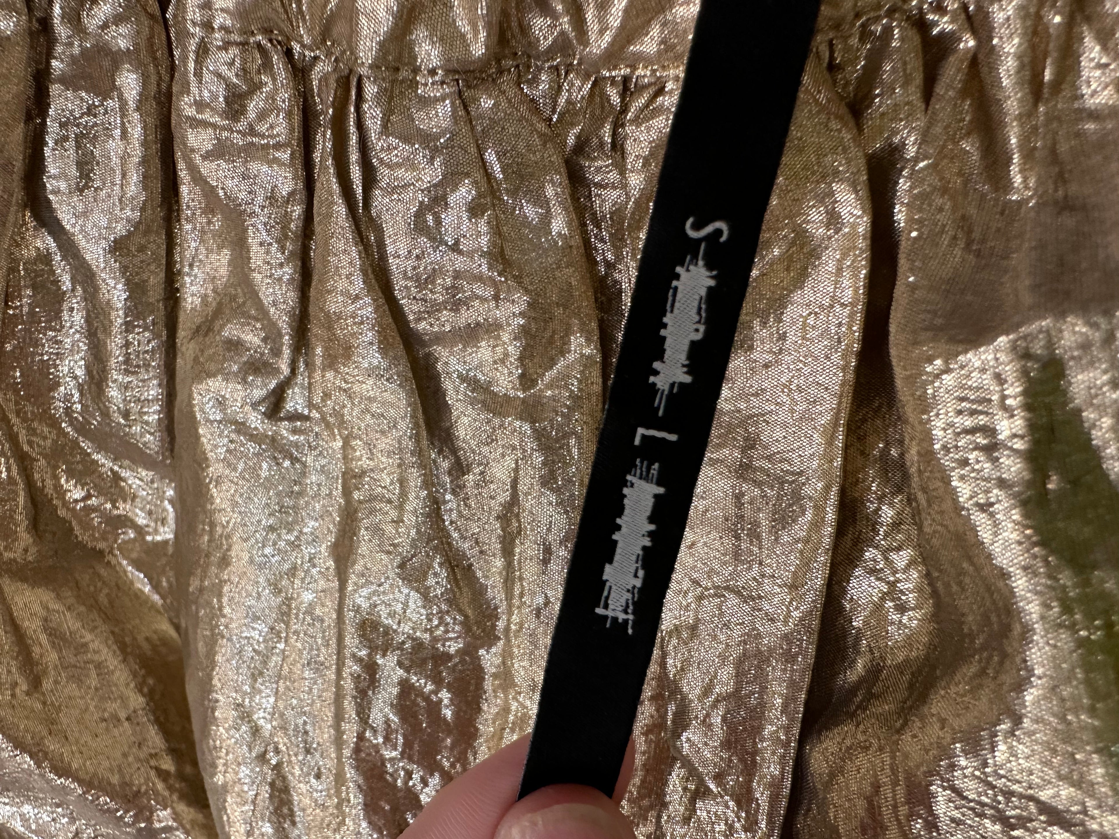 Gold Skirt The Cotswolds Daughter
contemporary gold skirt women
statement gold skirt editorial style
elegant womens gold skirt