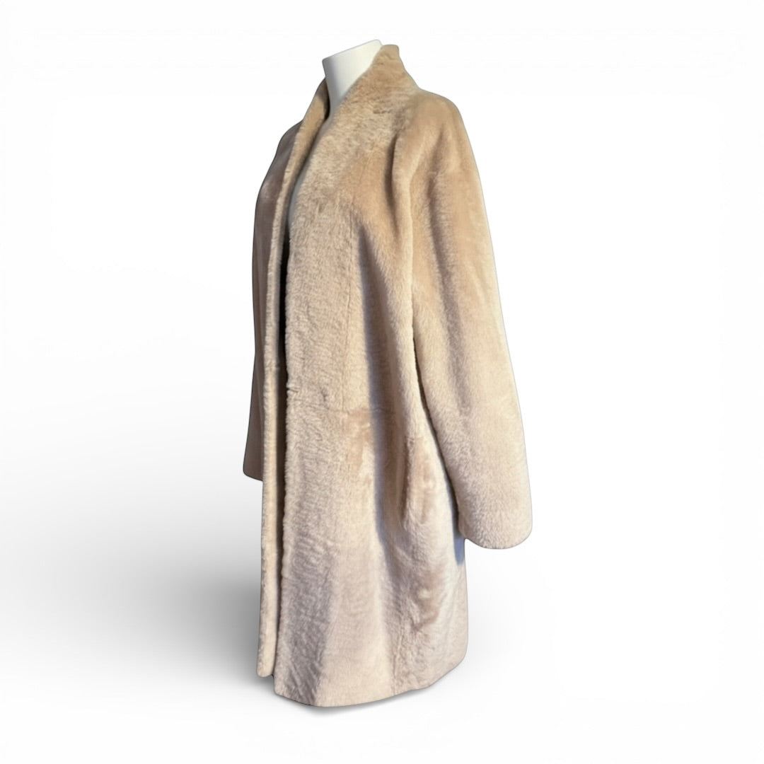 Gushlow and Cole soft pink sheepskin coat The Cotswolds Daughter
luxury pink sheepskin coat women
Gushlow and Cole designer coat editorial style
soft pink winter statement coat women