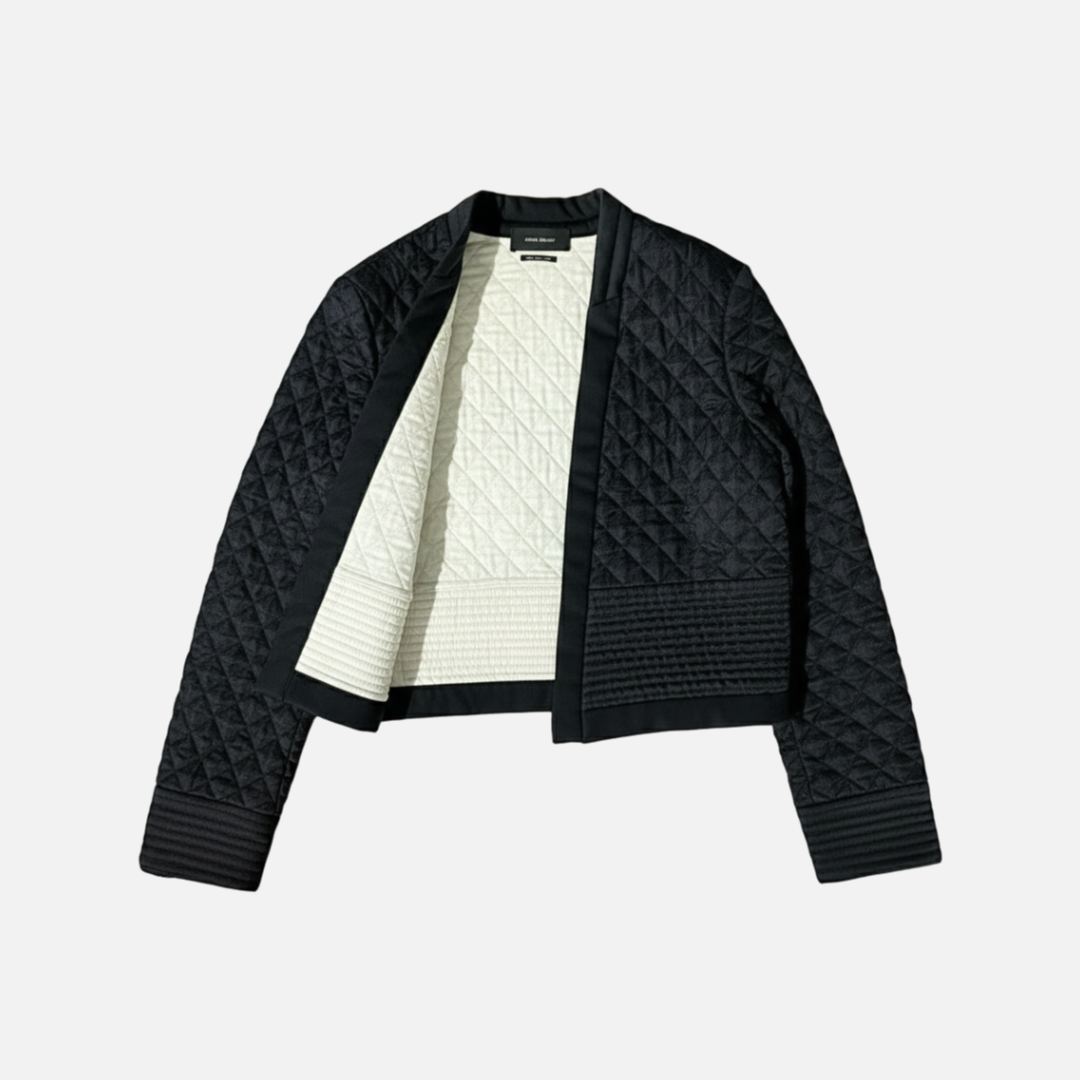 Isabel Marant black quilted jacket The Cotswolds Daughter
designer black silk jacket women
Isabel Marant black jacket editorial style
luxury black statement jacket women