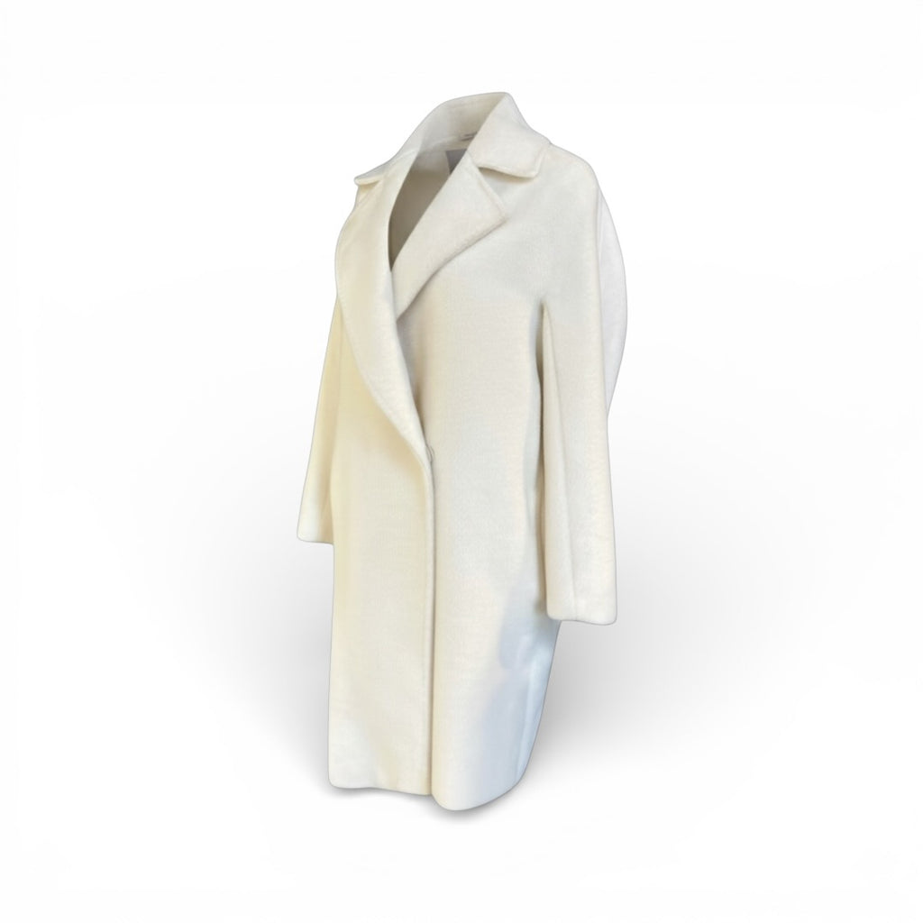 Max Mara white wool coat The Cotswolds Daughter
soft white designer coat women
Max Mara wool coat editorial style
luxury white wool coat women
