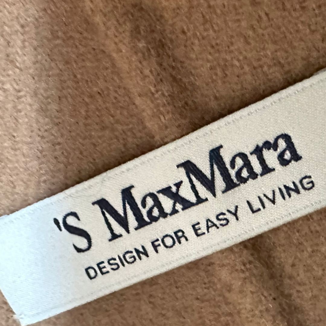 Max Mara tan long blazer The Cotswolds Daughter
classical tan designer blazer women
Max Mara woolen blazer editorial style
luxury longline blazer women