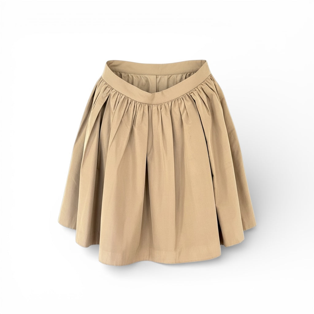 Miu Miu Taffeta Skirt The Cotswolds Daughter
dark tan golden designer skirt women
Miu Miu golden skirt editorial style
luxury taffeta skirt women