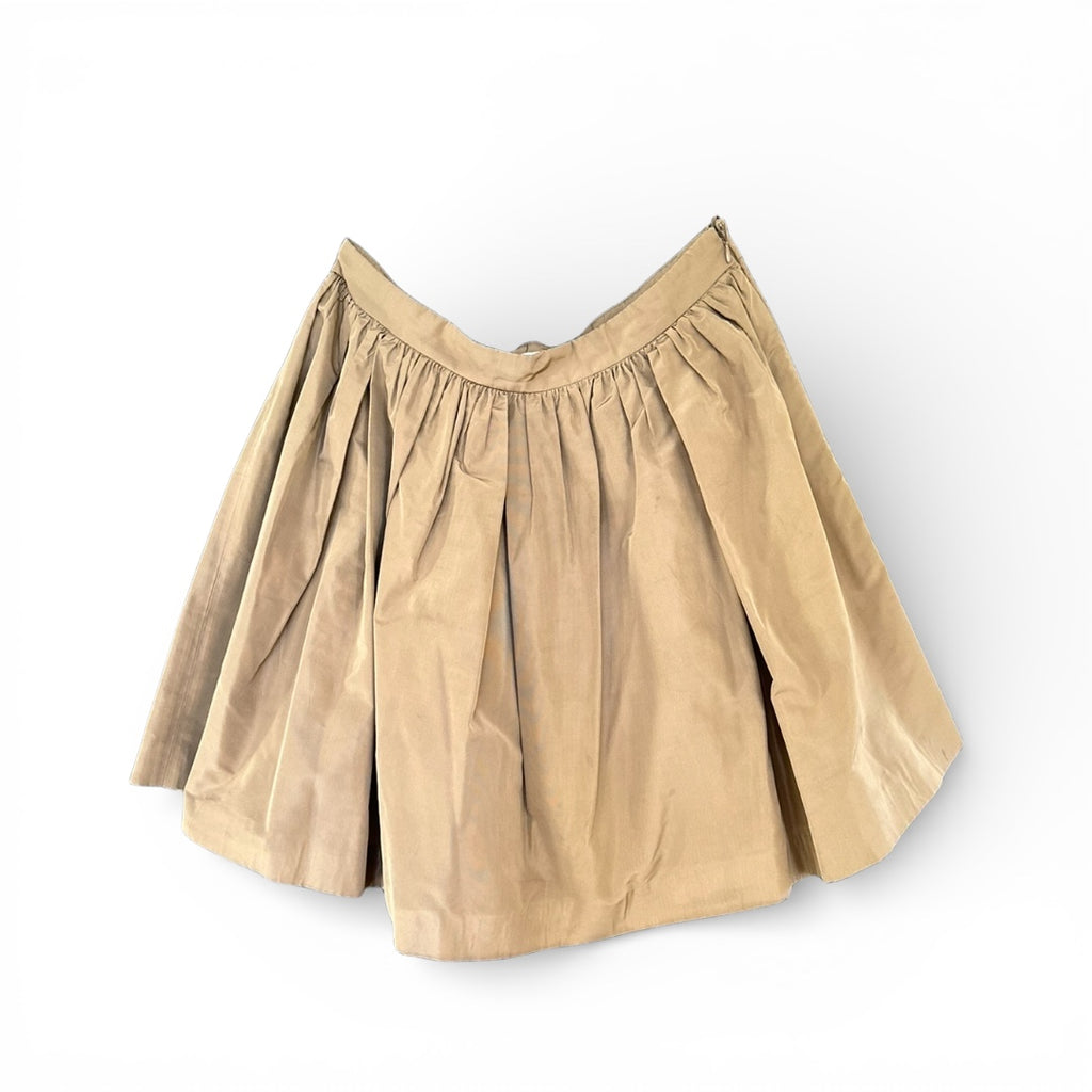 Miu Miu Taffeta Skirt The Cotswolds Daughter
dark tan golden designer skirt women
Miu Miu golden skirt editorial style
luxury taffeta skirt women