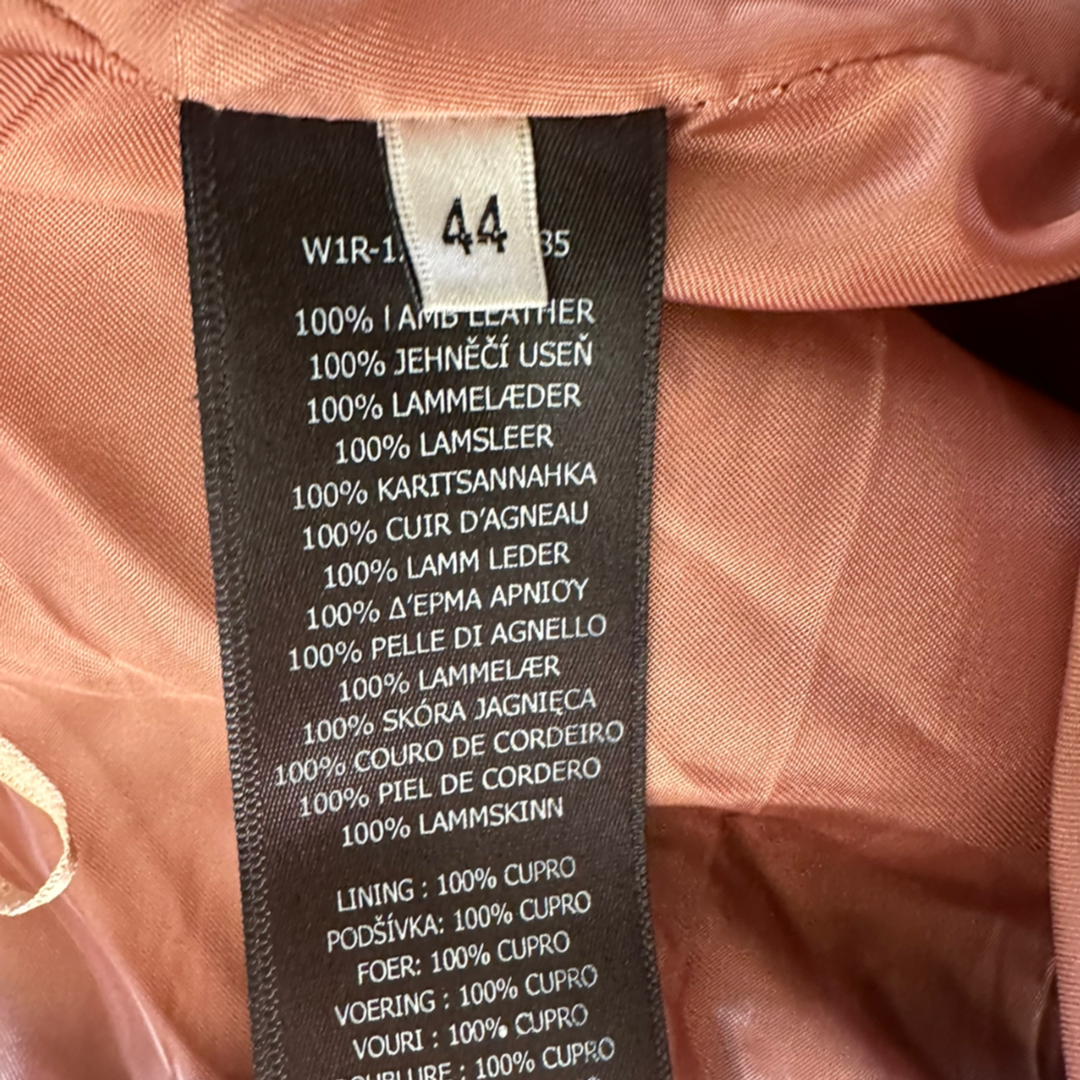 Paul Smith leather skirt The Cotswolds Daughter
tan pleated leather skirt women
designer leather skirt Paul Smith
soft tan leather skirt editorial style